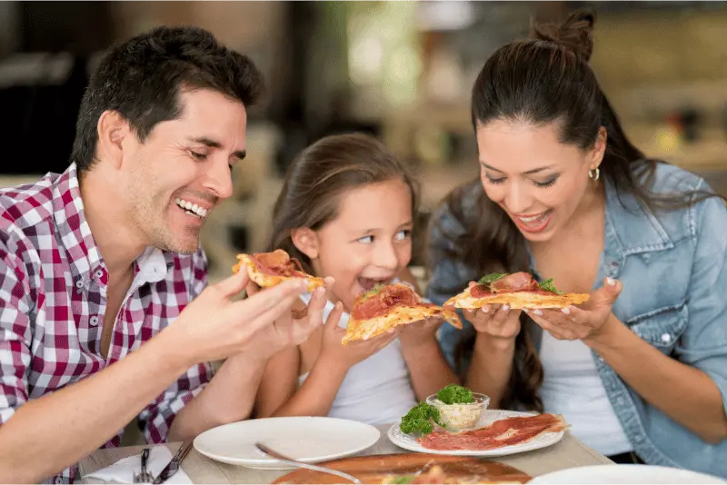 Kiosk360 Restaurant - Happy Family Enjoying Their Meal in a QSR